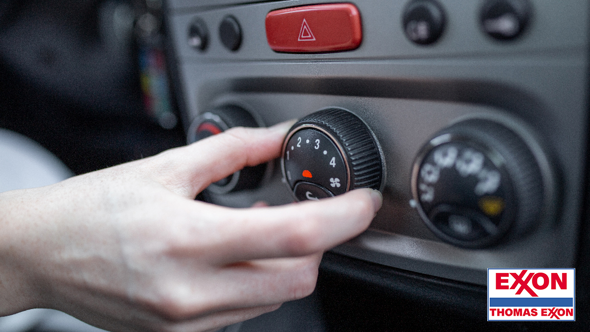 Woman hand turning on auto air conditioning repair button