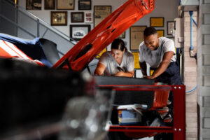 a couple diagnosing car issues themselves, auto repair in corpus christi